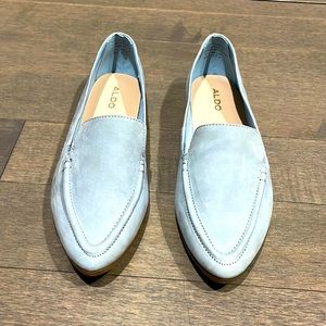 Light blue flats with rubber sole.